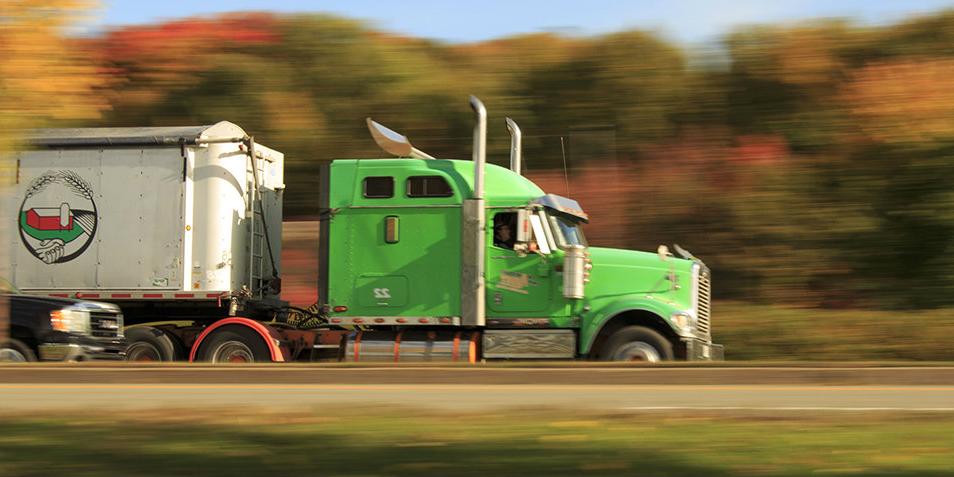 Eighteen wheeler truck driving