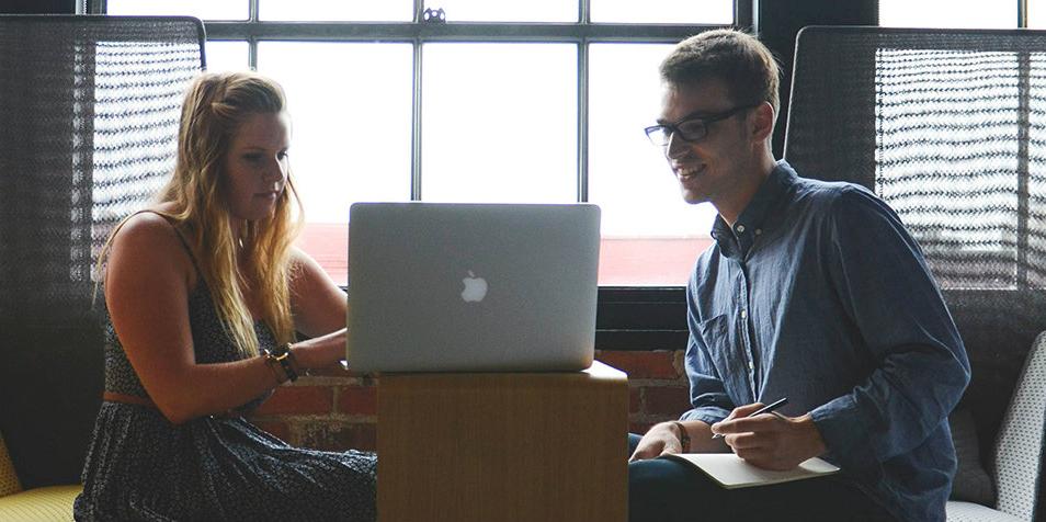 Students working together on laptop